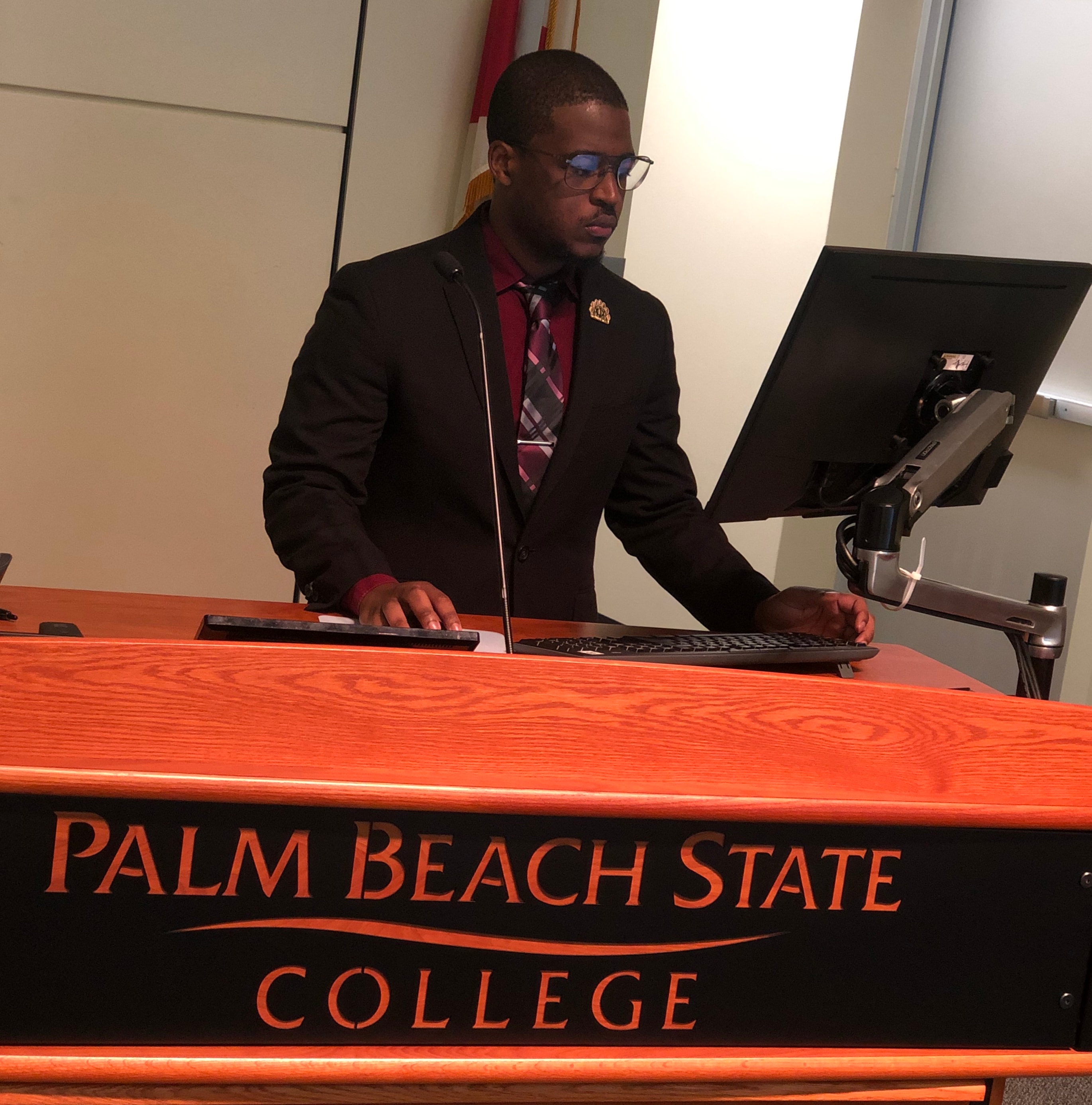 Sevonte Miller at the Palm Beach State College podium
